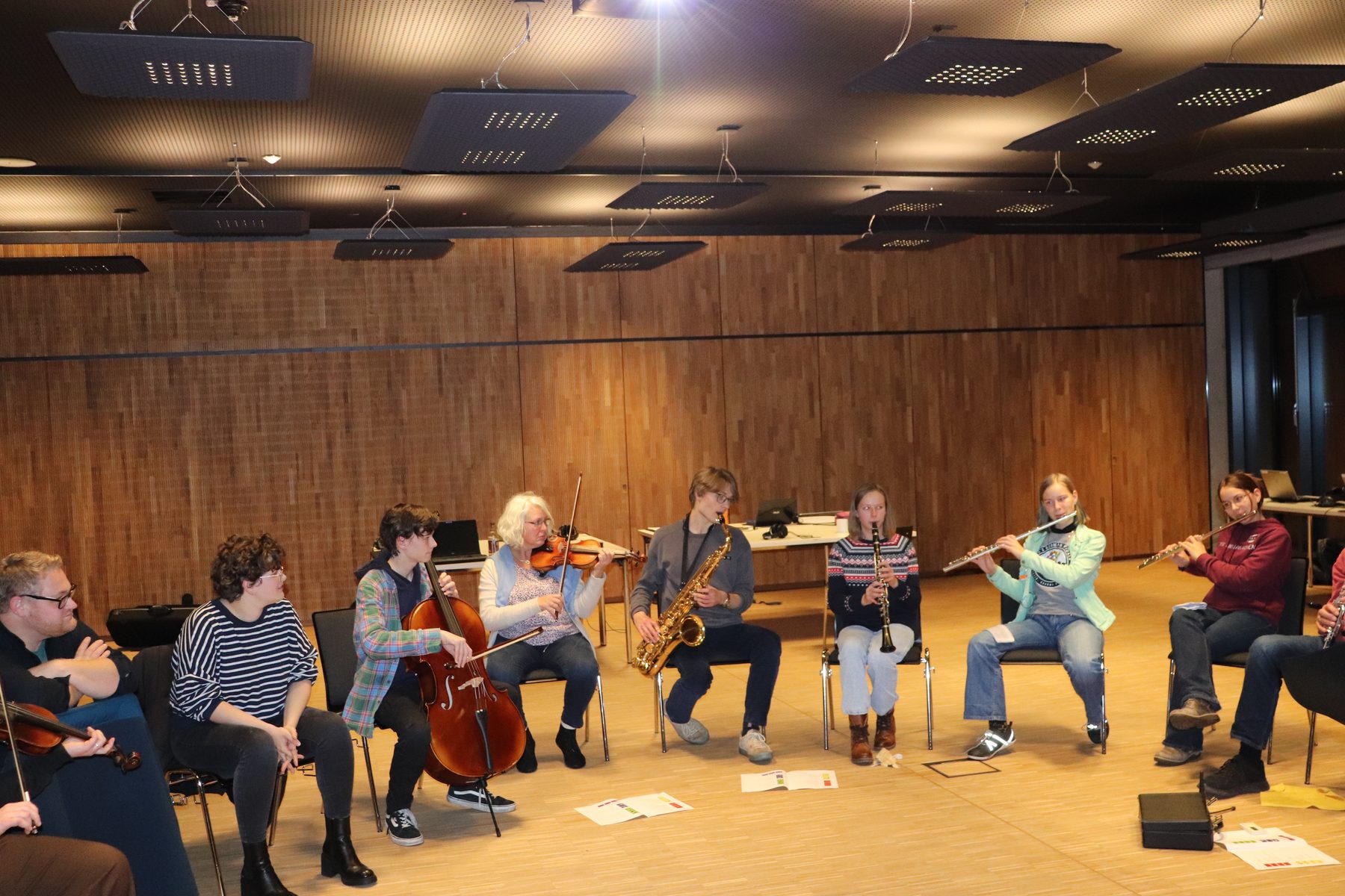 The group playing together in a circle